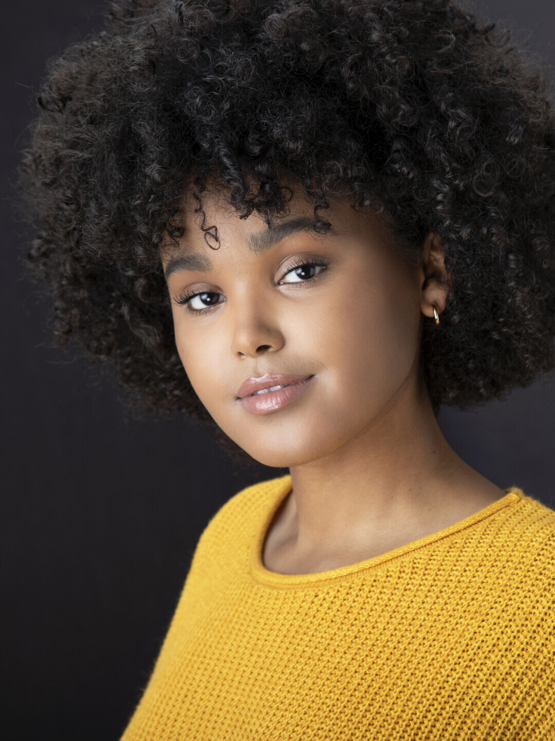 A young woman named Catherine Owens smiles softly. 