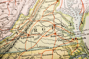 A close-up of a vintage Virginia map, showing cities like Petersburg and Richmond.