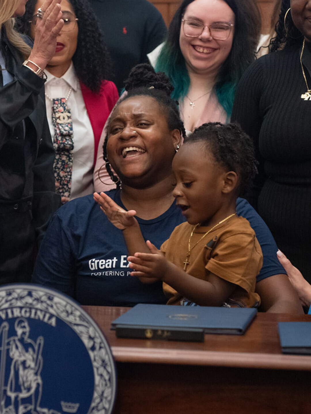 Farrah Webb and her son Feenyx at the 2025 Children's Ombudsman Youth Bill Ceremony.
