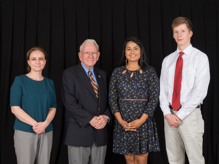Ben poses next to other scholarship celebration attendees and the late William H. Talley III.