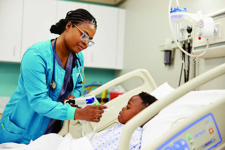 links to A nursing student performs a check-up on a child. 