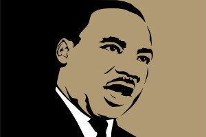 An outline of Dr. Martin Luther King, Jr.'s face mid-speech. 