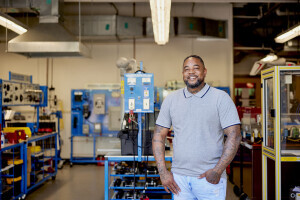 Student standing in skilled trades lab